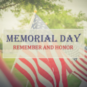 American Flag outside with transparent banner that reads Memorial Day remember and honor